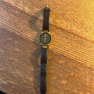 Ladies Gold and black Citizen Watch - Eco drive (powered by light)